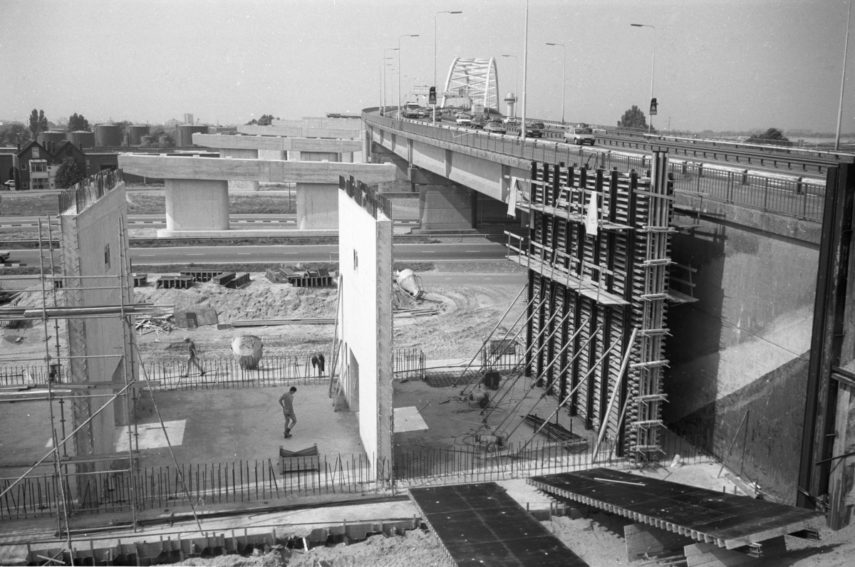 The Van Brienenoordbrug with pillars for the second bridge on the left site. (1988)