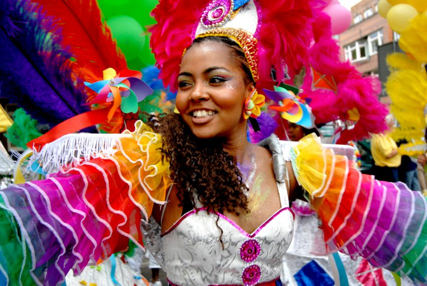 Happy dressed girl during the summer carnaval