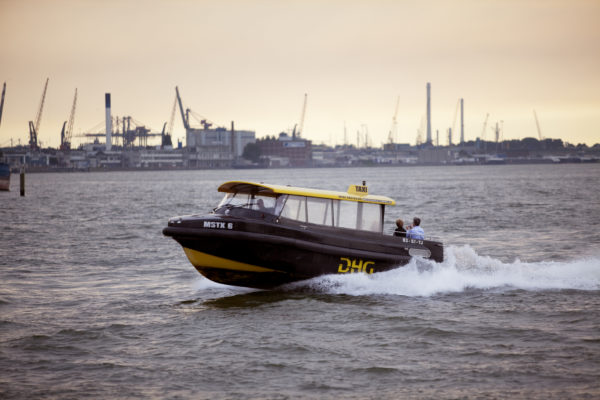 The Watertaxi sails on the Maas