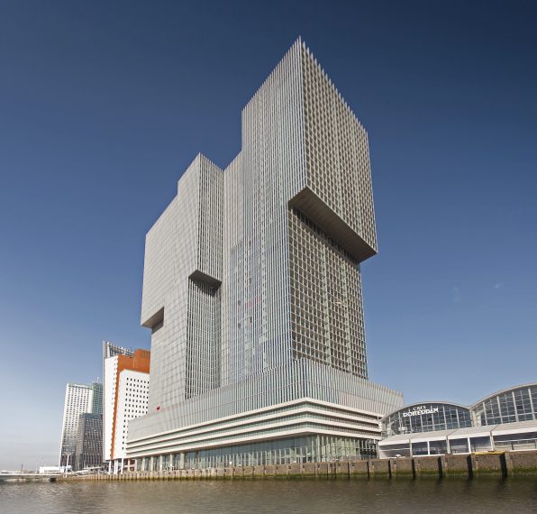 The building De Rotterdam is in area the largest in the Netherlands. The building on the right with the two arcs is the cruise terminal.