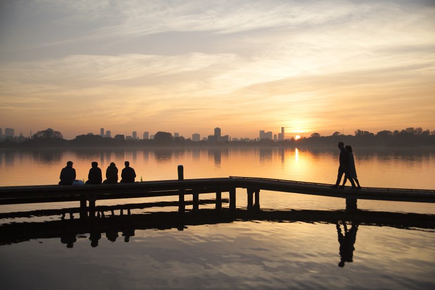 The Kralingse Plas  at sunset, with the skyline of Rotterdam in the background.