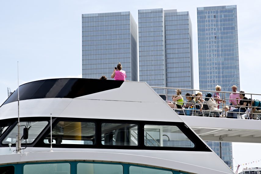Tourists on a Spido ship, De Rotterdam in the background