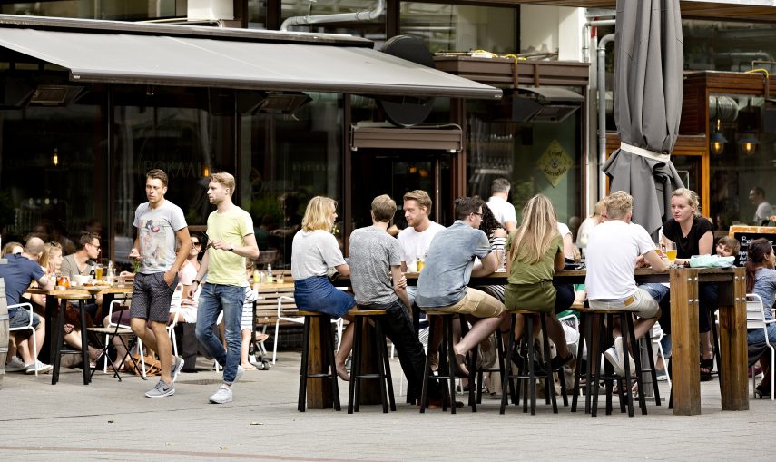 People enjoying themselves at a terrace at Nieuwemarkt