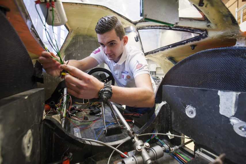 A student works on an innovative vehicle at RDM Rotterdam.