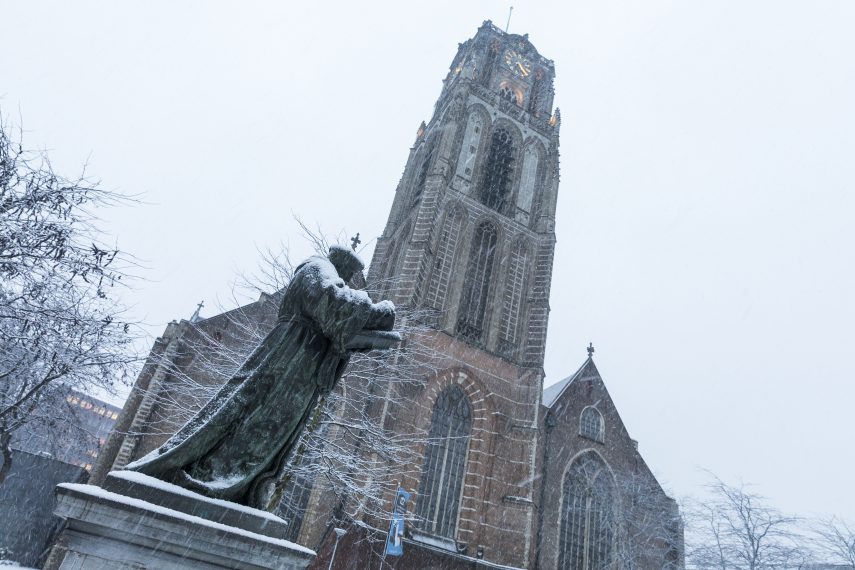 The statue of Erasmus with in the background the Grote of Sint-Laurenschurch.