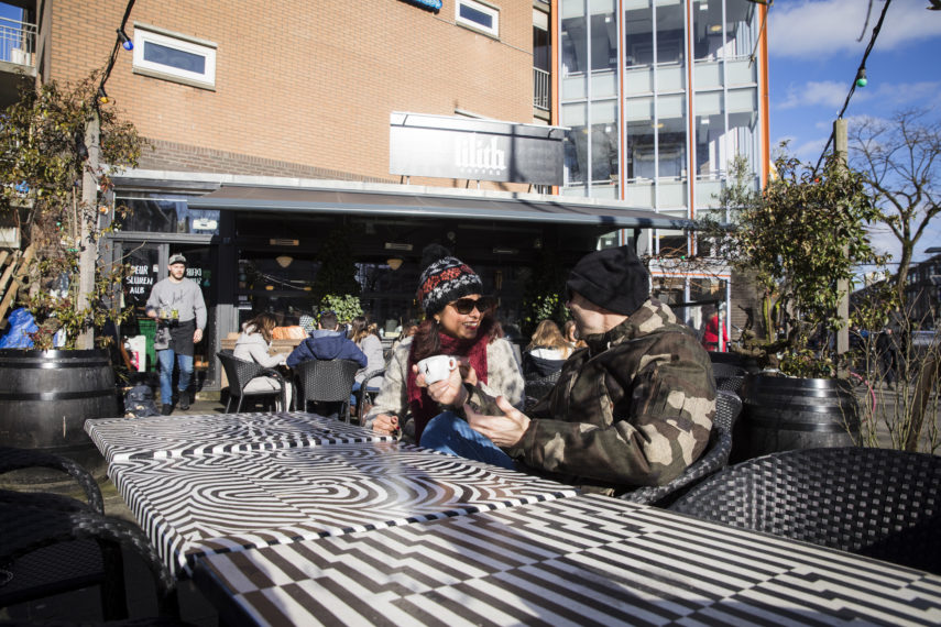 A couple enjoys the winter sun on the terrace of Lillith.
