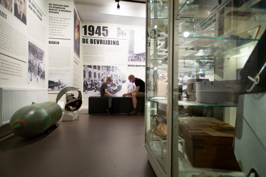 Father and son in Museum Rotterdam 1940 - 1945 in the district of Middelland.