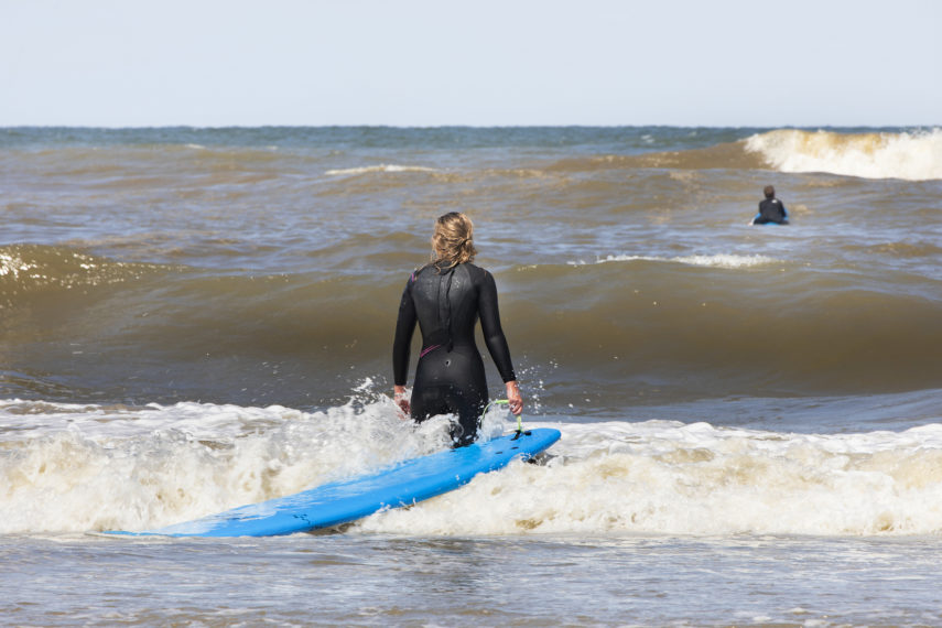 Surfer in the sea near Hoek van Holland.