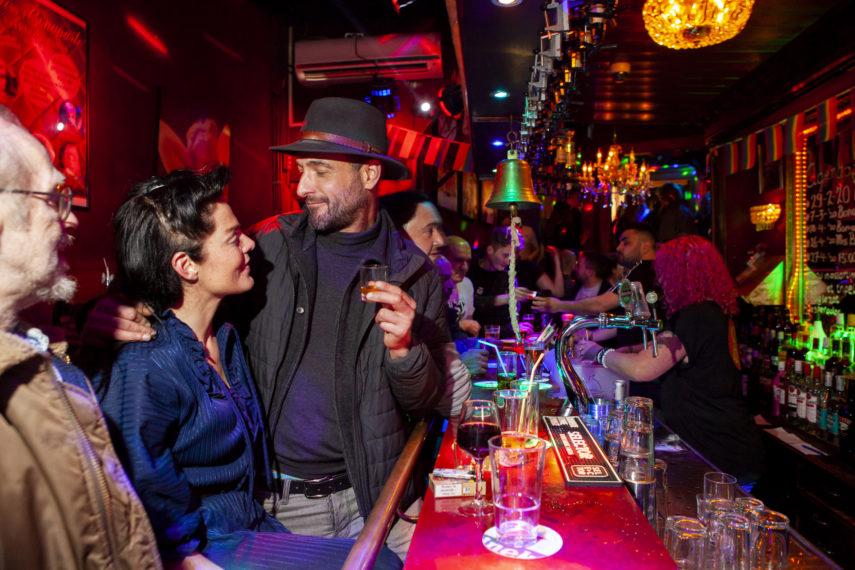 People at the bar of Café Bonaparte.