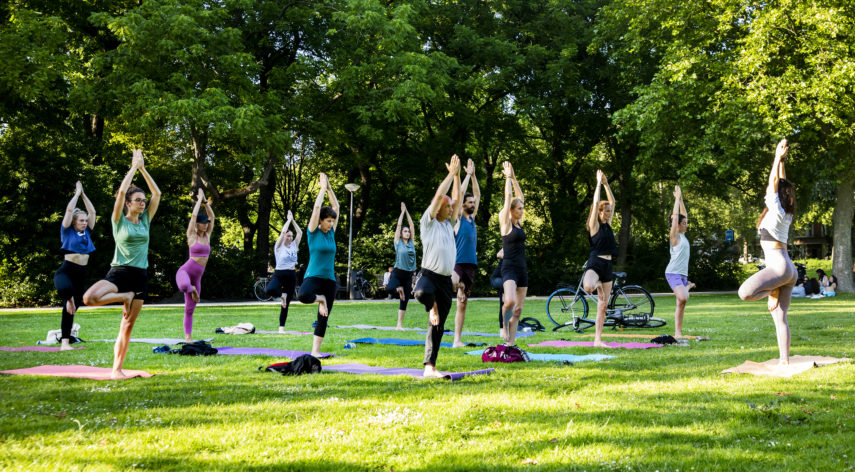 Yoga exercises in a park.