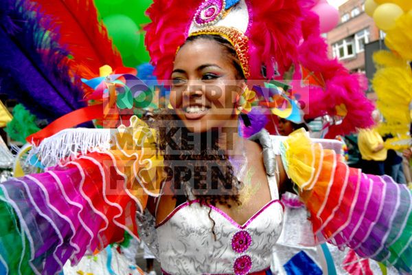 Happy dressed girl during the summer carnaval