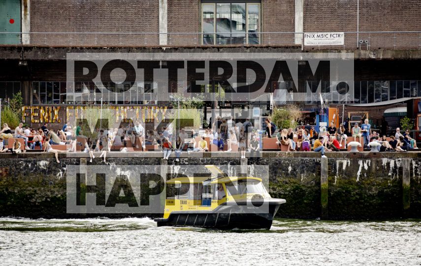 Water Taxi Leaves The Quay Near The Fenix Food Factory