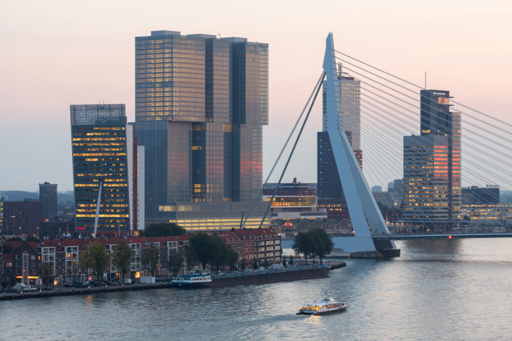 De Rotterdam is the largest multipurpose building in the Netherlands (160,000m2), designed by OMA. In front you'll see the Noordereiland.
