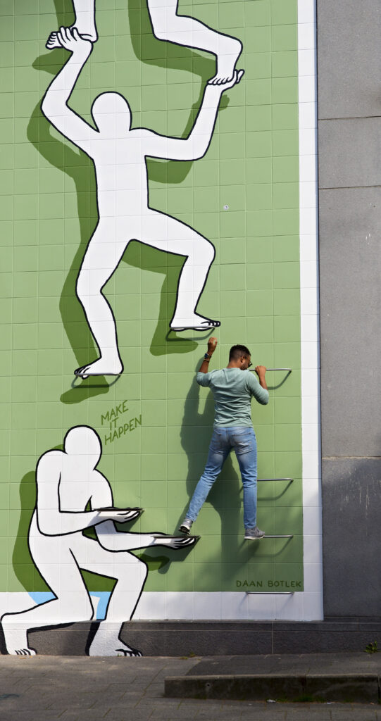 Rotterdam Make It Happen street art ontworpen door Daan Botlek op de Schiedamse Vest.