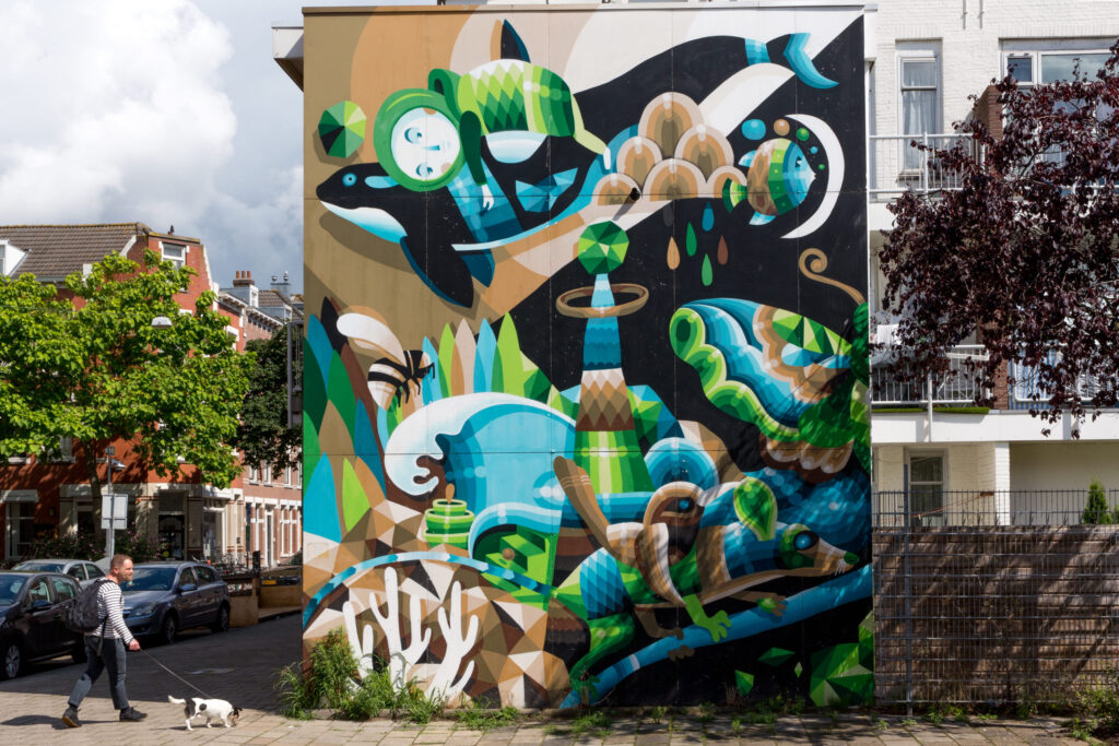 Een modern streetart werk door Eelco van den Berg, getiteld 'Concrete Jungle'. Dit werk is te zien aan de Schans (49), Rotterdam.